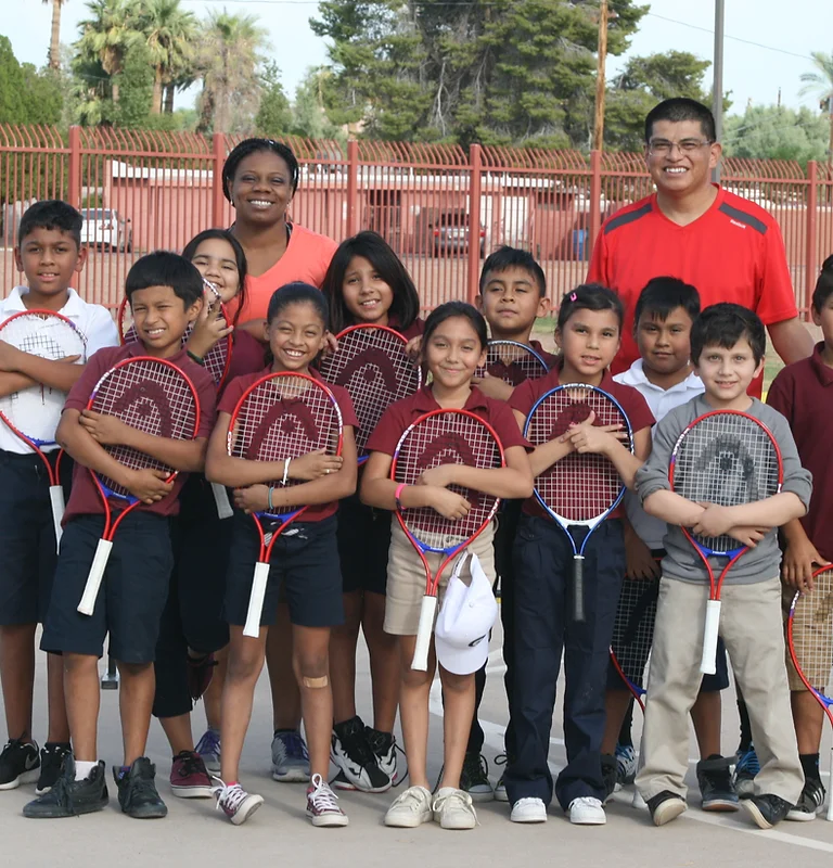 Photo of a group of kids at the Pass Kids tennis event.